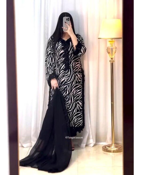 Front view of Faraasha Lawn 3PC suit with embroidered neckline and daman patches from Summer Collection 2025